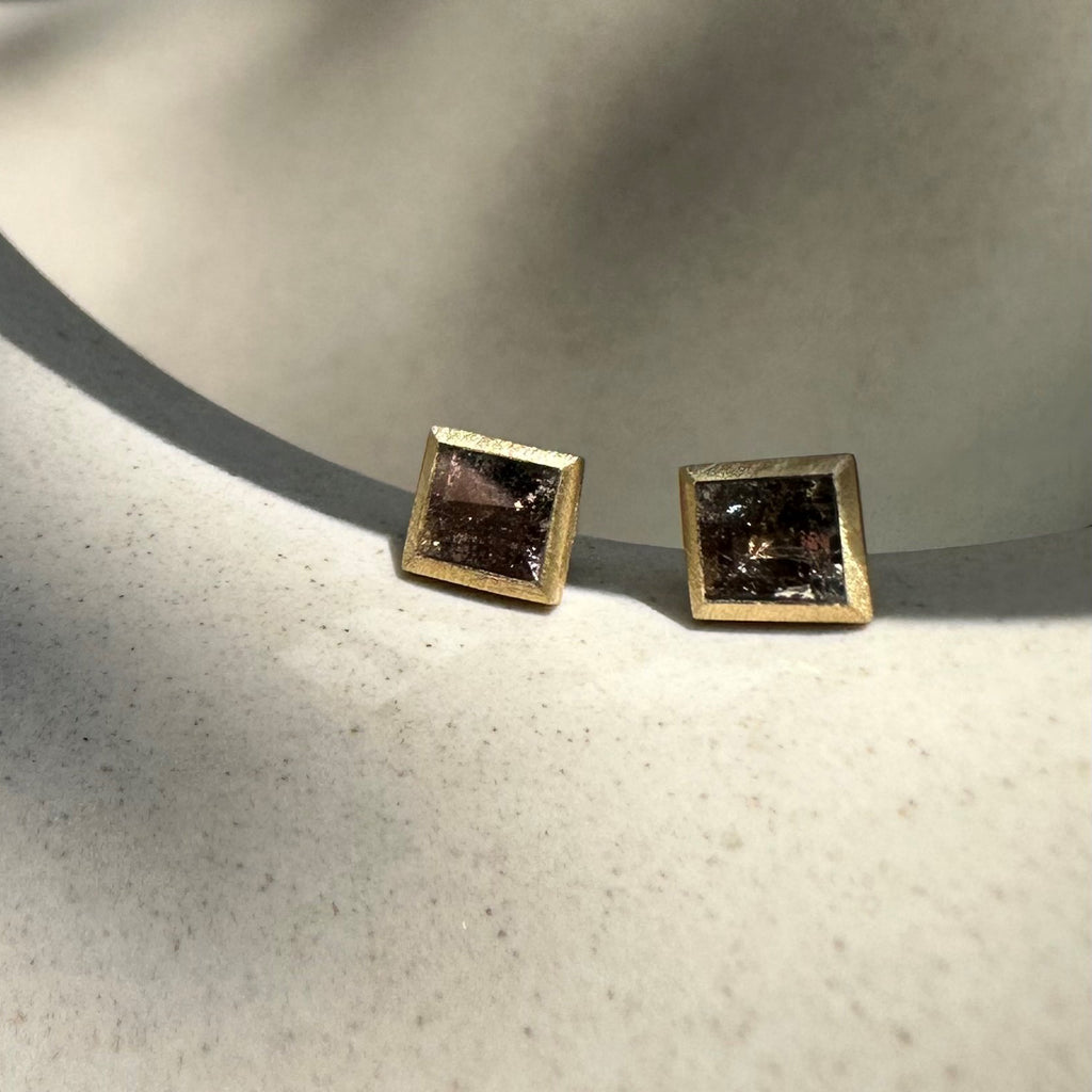 Salt and pepper diamond earrings by contemporary jewellery designer, Sarah Straussberg