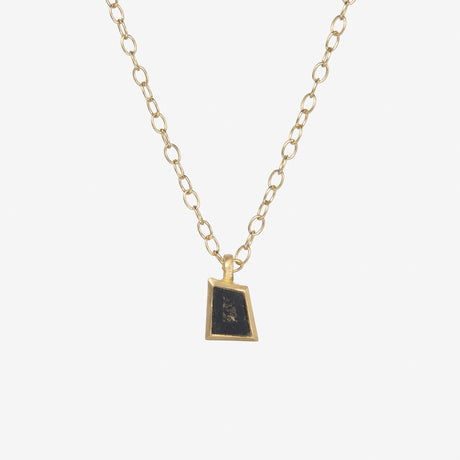 A salt and pepper diamond pendant by contemporary jewellery designer, Sarah Straussberg