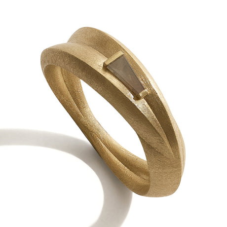 Matte gold ring featuring salt and pepper diamond by contemporary jewellery designer, Sarah Straussberg