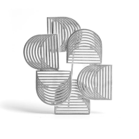 A contemporary sterling silver brooch with a matte finish, by contemporary jewellery designer, Sarah Straussberg