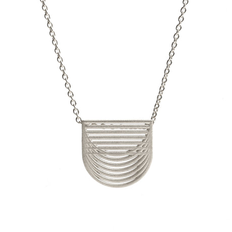 Sterling silver pendant by contemporary jewellery designer, Sarah Straussberg