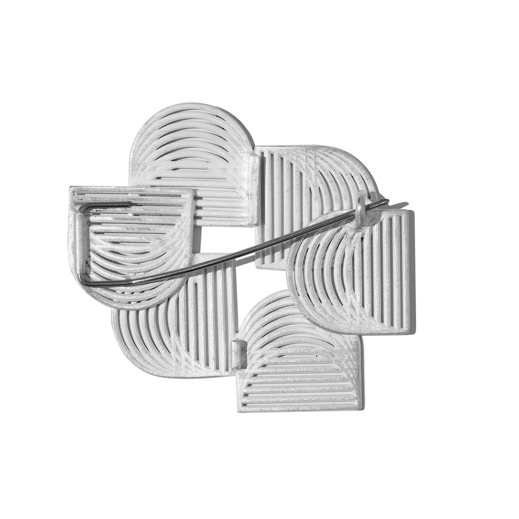 Back of contemporary sterling silver brooch with a matte finish, by contemporary jewellery designer, Sarah Straussberg