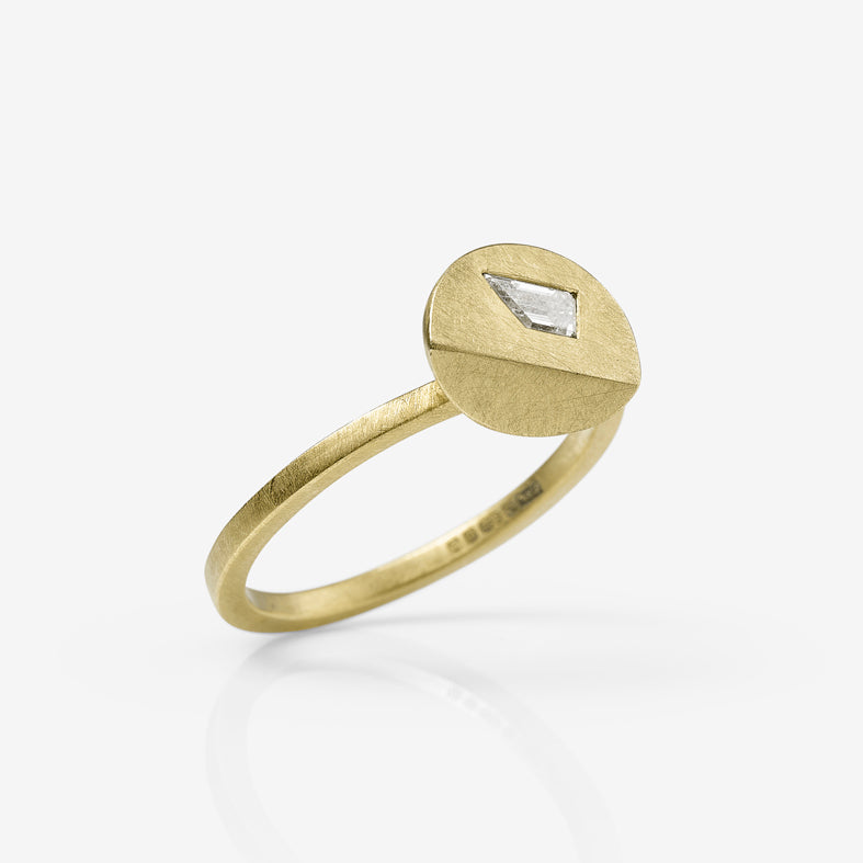 Whistle cut diamond ring by contemporary jewellery designer, Sarah Straussberg