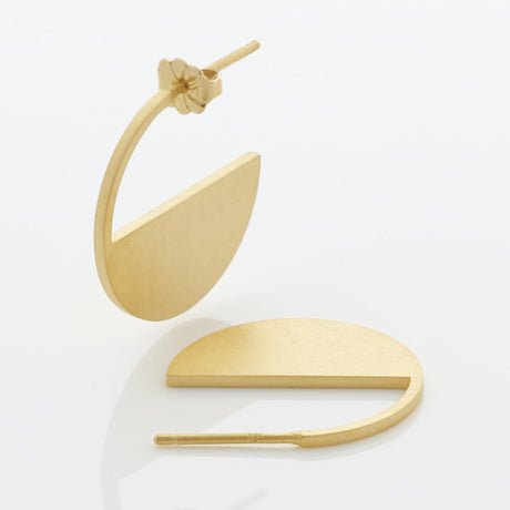 Large geometric gold plated hoops by contemporary jewellery designer, Sarah Straussberg