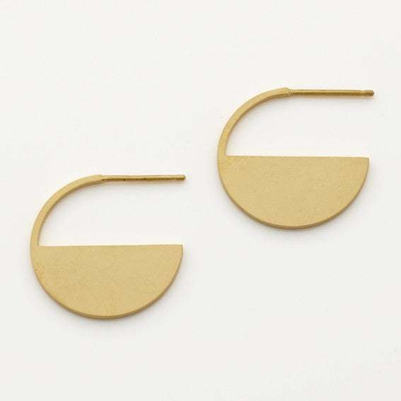 Large geometric gold plated hoops by contemporary jewellery designer, Sarah Straussberg