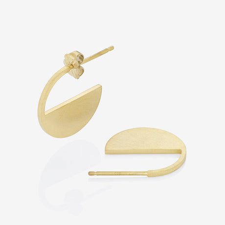 A pair of small-sized geometric hoop earrings made from gold plated silver and a matte finish. By contemporary jewellery designer, Sarah Straussberg